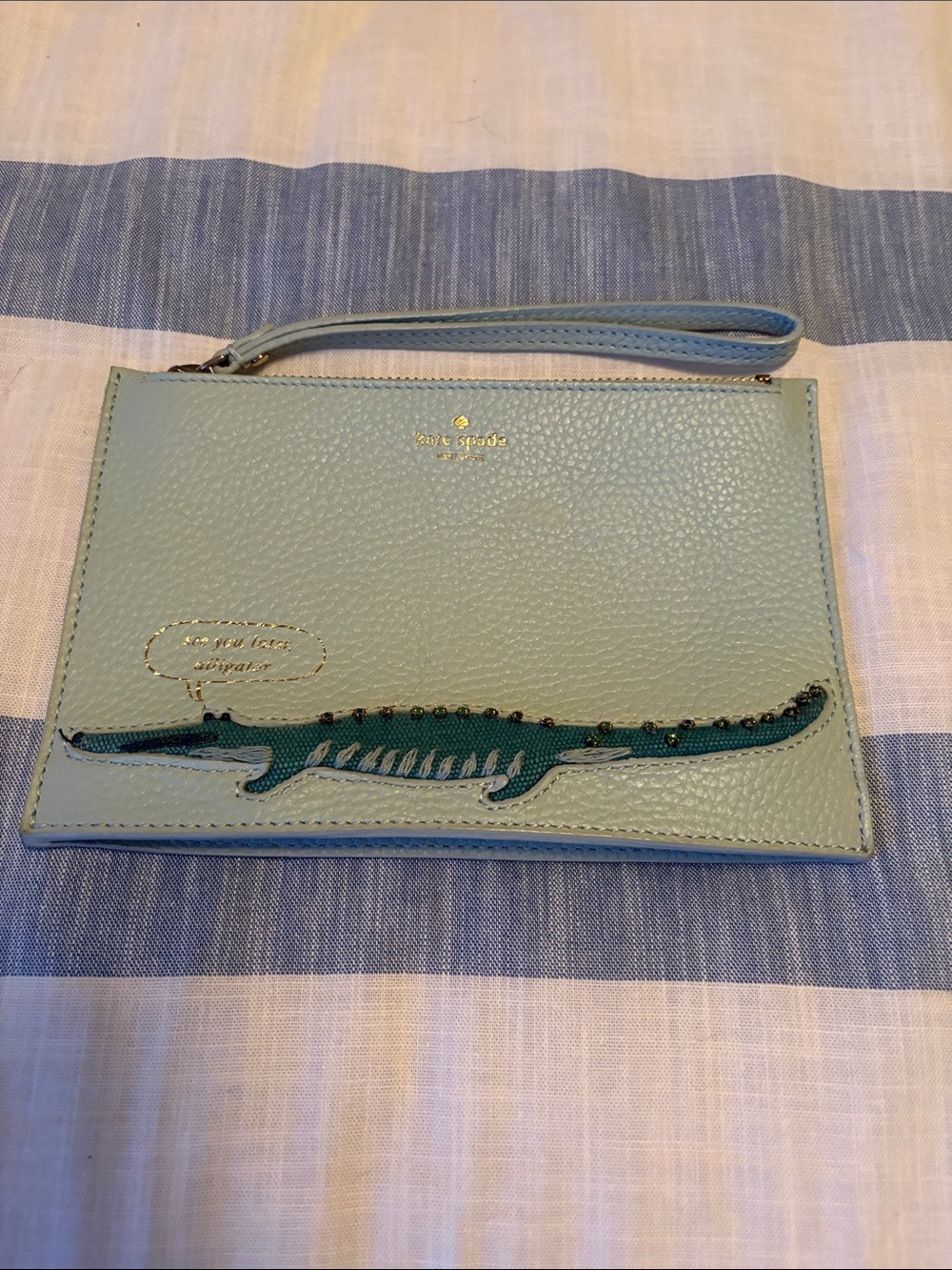 kate spade mint green wristlet with teal alligator applique